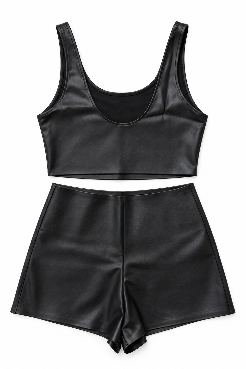 Completo sportivo nero con top cropped e shorts